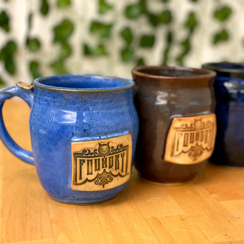 set of three foundry mugs in blue, brown and dark blue